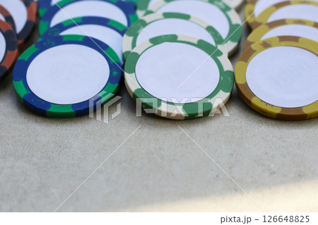 Casino chips on grey background. Casino chips on grey background. 126648825