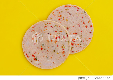 Spicy sliced bologna sausage with chili 126648872