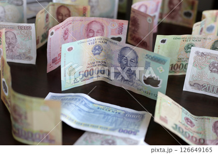 Vietnamese dong banknotes. Money concept Vietnamese dong banknotes. Money concept 126649165