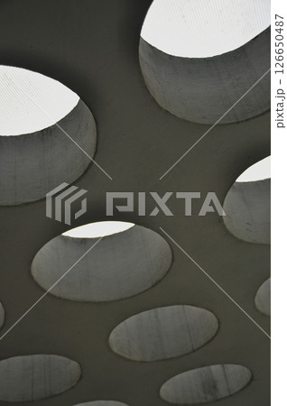 Round skylights in rows in a concrete ceiling, modern architecture 126650487