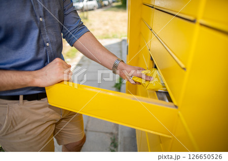 Engaging with a contemporary and efficient Yellow Parcel Locker System for managing deliveries Engaging with a contemporary and efficient Yellow Parcel Locker System for managing deliveries 126650526