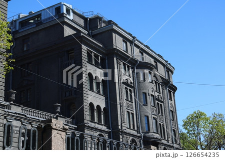 Stunningly Imposing Black Architecture Set Against a Vast and Clear Blue Sky Above Stunningly Imposing Black Architecture Set Against a Vast and Clear Blue Sky Above 126654235