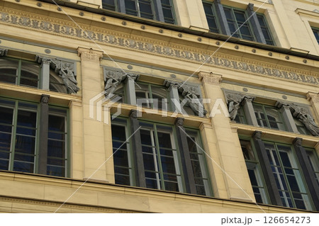 Exquisite Architectural Detail of a Historic Building Facade Showcasing Unique Features Exquisite Architectural Detail of a Historic Building Facade Showcasing Unique Features 126654273