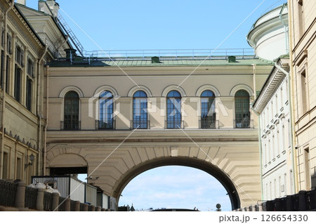 A Historic Archway That Serves as an Impressive Connection Between Buildings in a Cityscape A Historic Archway That Serves as an Impressive Connection Between Buildings in a Cityscape 126654330