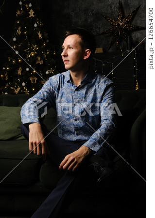 A Stylish and Artistic Portrait of a Young Man Relaxing in Trendy and Casual Attire A Stylish and Artistic Portrait of a Young Man Relaxing in Trendy and Casual Attire 126654700