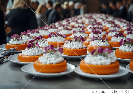 Elegant catered event showcasing beautifully adorned pumpkin appetizers 126655101