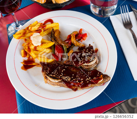 Grill dish Churasco of beef with barbecue sauce with vegetables 126656352