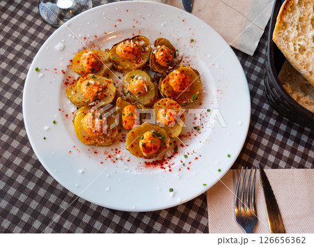 Spanish fried potatoes patatas bravas 126656362