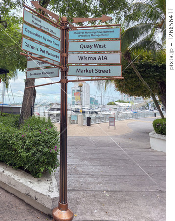 Directional signpost listing various locations in Penang with clear labels 126656411