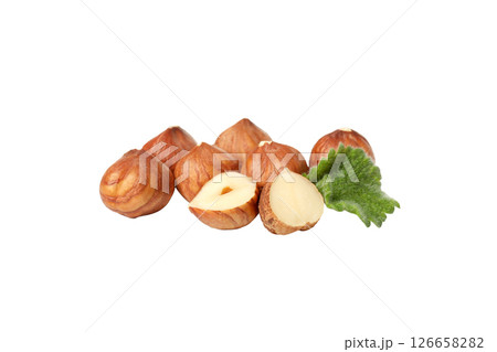 PNG, Peeled hazelnuts and leaves, isolated on white background 126658282