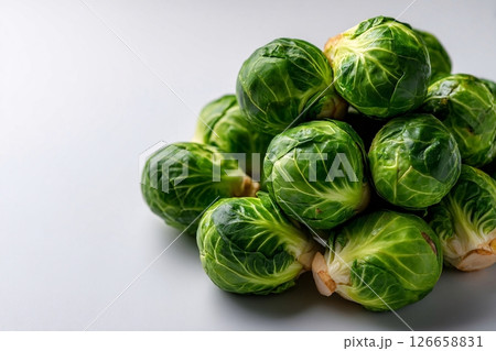 tempting brussels sprouts in the minimalist corner on a white background 126658831