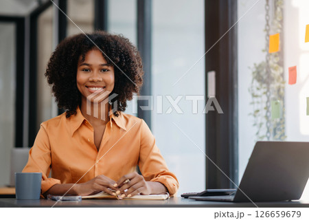 Asian woman feeling migraine head strain.Overworked businesswoman financier while working on laptop and tablet at office. Asian woman feeling migraine head strain.Overworked businesswoman financier while working on laptop and tablet at office. 126659679