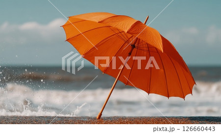 Orange Umbrella on Sandy Beach with Waves 126660443