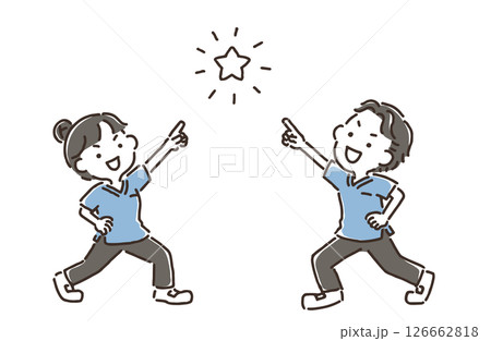 腰に手を当てて星を指差しているスクラブ姿の女性と男性 126662818