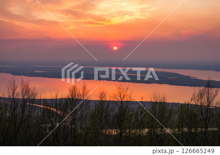 The sunset and river beyond the horizon 126665249