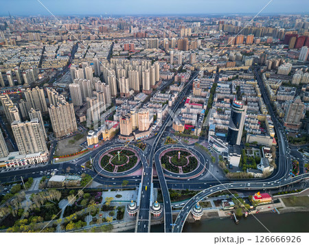 Harbin, CHINA-MAY 05, 2025-Aerial cityscape of Harbin's downtown, is the capital of Heilongjiang, China. It is the largest city of Heilongjiang 126666926