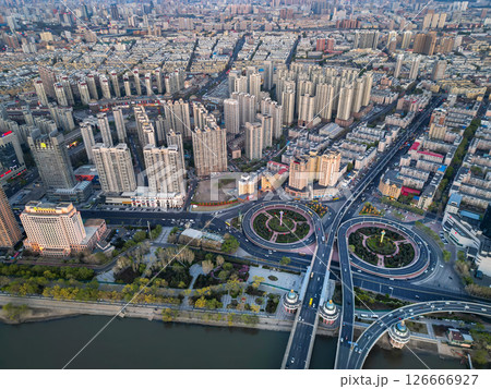 Harbin, CHINA-MAY 05, 2025-Aerial cityscape of Harbin's downtown, is the capital of Heilongjiang, China. It is the largest city of Heilongjiang 126666927