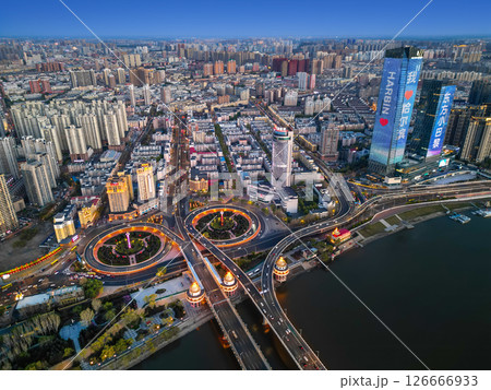 Harbin, CHINA-MAY 05, 2025-Aerial cityscape of Harbin's downtown, is the capital of Heilongjiang, China. It is the largest city of Heilongjiang 126666933