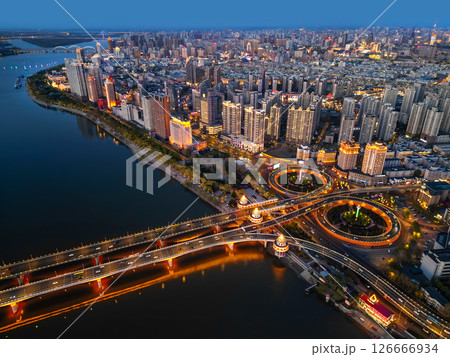 Harbin, CHINA-MAY 05, 2025-Aerial cityscape of Harbin's downtown, is the capital of Heilongjiang, China. It is the largest city of Heilongjiang 126666934