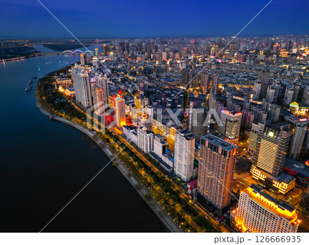 Harbin, CHINA-MAY 05, 2025-Aerial cityscape of Harbin's downtown, is the capital of Heilongjiang, China. It is the largest city of Heilongjiang 126666935