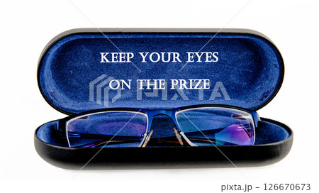 Perfect for themes of determination and success. Inspirational quote KEEP YOUR EYES ON THE PRIZE 126670673