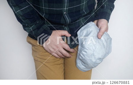 Incontinence pads for men. Urinary incontinence. Sanitary pads for men with problems of the genitourinary system. Urine leakage due to prostatitis or stress. Incontinence pads for men. Urinary incontinence. Sanitary pads for men with problems of the genitourinary system. Urine leakage due to prostatitis or stress. 126670881