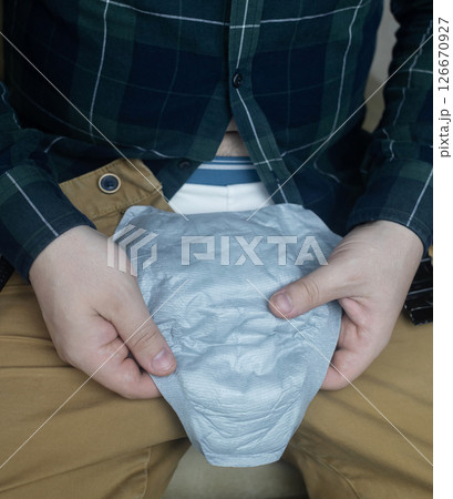 Incontinence pads for men. Urinary incontinence. Sanitary pads for men with problems of the genitourinary system. Urine leakage due to prostatitis or stress.  126670927