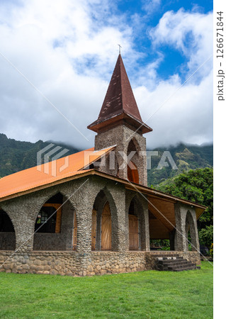 Vaitahu catholic church in Tahuata, Marquesas Islands, French Polynesia, mountain backdrop Vaitahu catholic church in Tahuata, Marquesas Islands, French Polynesia, mountain backdrop 126671844