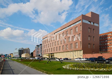 Modern urban architecture seamlessly combines attractive designs with wellplanned green spaces 126671898