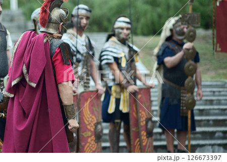 Roman Centurion and Legionaries in Battle Armor 126673397