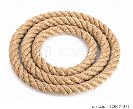 Artistically Arranged Natural Hemp Rope in Concentric Circles on White Background 126674371
