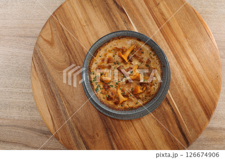 Baked chanterelle dish. Delicious freshly prepared meal, perfect for menus, restaurants, or food delivery concepts. 126674906