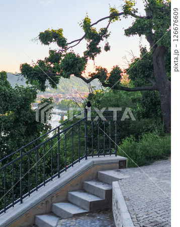Scenic view of prague's riverside at sunset letna park Scenic view of prague's riverside at sunset letna park 126676609