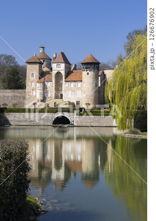 Chateau de Sercy reflecting in the moat in Saone et Loire, Bourgogne Franche Comte, France Chateau de Sercy reflecting in the moat in Saone et Loire, Bourgogne Franche Comte, France 126676902
