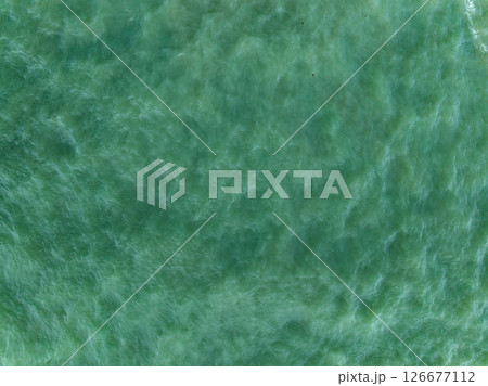 Top view sea surface nature background,Wide angle view ocean waves background. 126677112