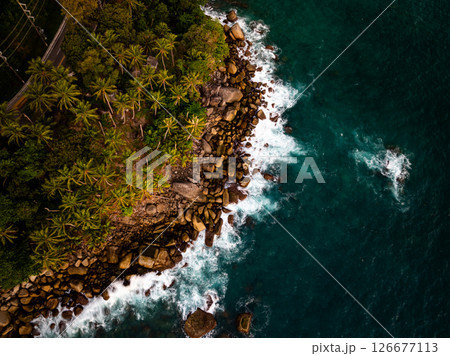 Top view sea surface nature background,Big waves crashing on rocks seascape background. 126677113