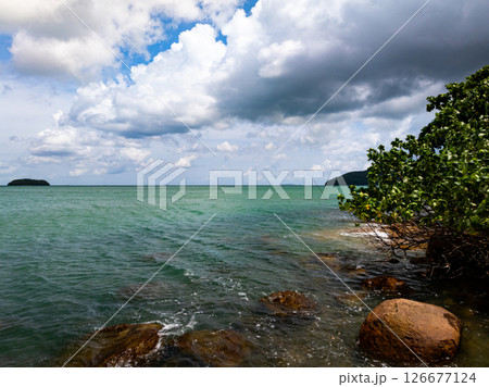 Aerial view landscape sea beach in raining season at Phuket island Thailand. 126677124