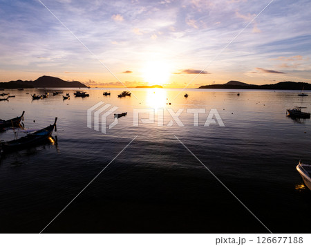 Aerial view sunset sky,Nature beautiful light Sunset or sunrise over sea,Colorful scenery sunset sky background,Amazing clouds and waves in sunrise sky nature light cloud background. 126677188