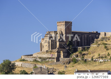 Priory Church of Our Lady of Aracena rising above Andalusian hills in Spain Priory Church of Our Lady of Aracena rising above Andalusian hills in Spain 126677369