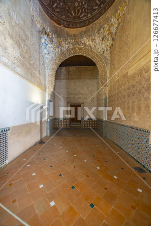 Exploring the Alhambra Palace, intricate moorish architecture and tilework in Granada, Spain 126677413