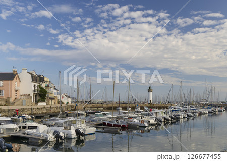 Port Maria lighthouse dominating Quiberon harbor in Brittany, France Port Maria lighthouse dominating Quiberon harbor in Brittany, France 126677455