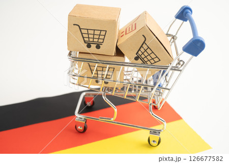 Box with shopping online cart logo and Germany flag, Box with shopping online cart logo and Germany flag, 126677582