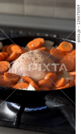 Cooking Sweet Potatoes and Carrots Together in a Pan on the Stove for a Delicious Meal Cooking Sweet Potatoes and Carrots Together in a Pan on the Stove for a Delicious Meal 126678004