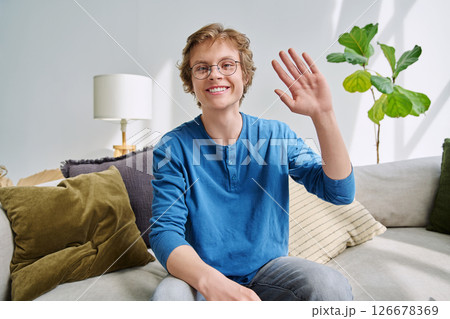 Webcam portrait male student teenager with glasses, sitting at home Webcam portrait male student teenager with glasses, sitting at home 126678369