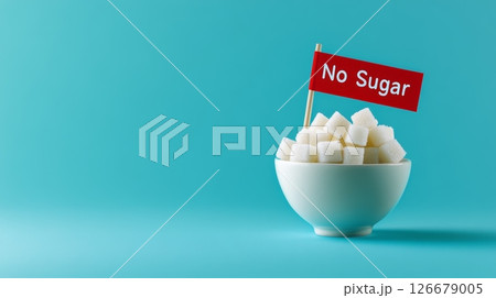 Bowl of sugar cubes with no sugar flag promoting healthy, low sugar lifestyle 126679005