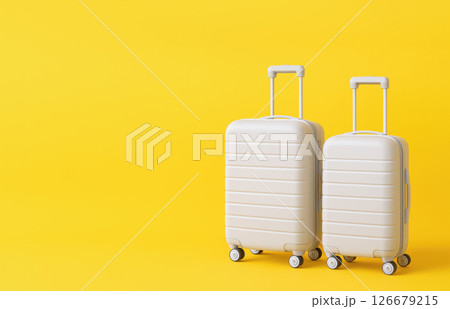 Two modern white suitcases with wheels and handles on bright yellow background, concept of travel, vacation, luggage, trip planning, holiday preparation 126679215