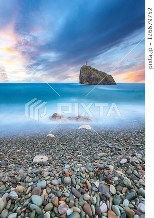 Amazing view of the beach and rocks shot with a long exposure. 126679752