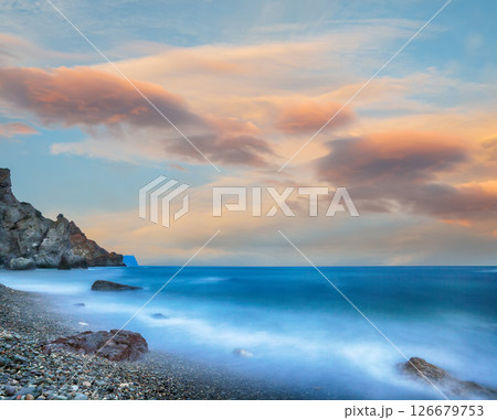 Amazing view of the beach and rocks shot with a long exposure. 126679753