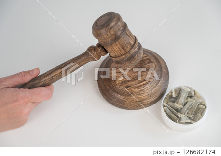 Judge Bangs Gavel. Chewing Tobacco Ban. Judge Bangs Gavel. Chewing Tobacco Ban. 126682174