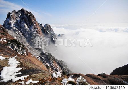 Mountain landscape after heavy snowfall, trees covered with snow and rime, sea of fluffy misty clouds ,China, Anhui Province, Mount Huang 126682530